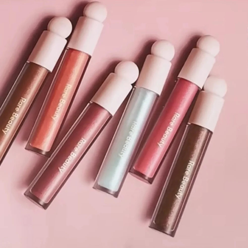 Rare Beauty Lip Gloss – Dewy, Plumping & Long-Lasting