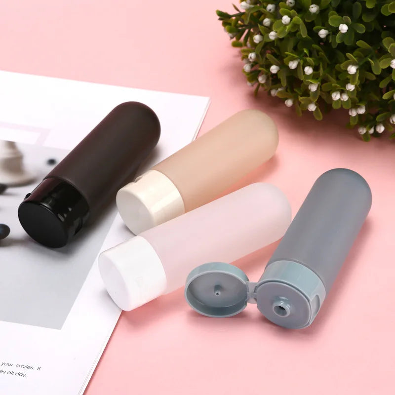 60ml Portable Plastic Tubes Bottling Bottle Cylindrical Squeeze Bottles Travel Cosmetic empty bottle for Shampoo and Shower Gel Peaceful Pleasures Health and Wellness