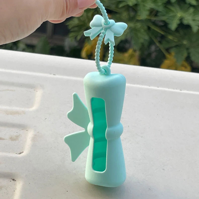 Bow Candy Peanut Shape Silicone Lipstick Cover Keychains Portable Solid Color Lipstick Storage Bag Light Weight Lip Balm Holder Peaceful Pleasures Health and Wellness D Cyan