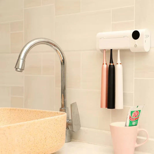Hot Selling Custom Plastic Wall Mounted Automatic Toothpaste Dispenser UV Toothbrush Holder Squeezer Peaceful Pleasures Health and Wellness