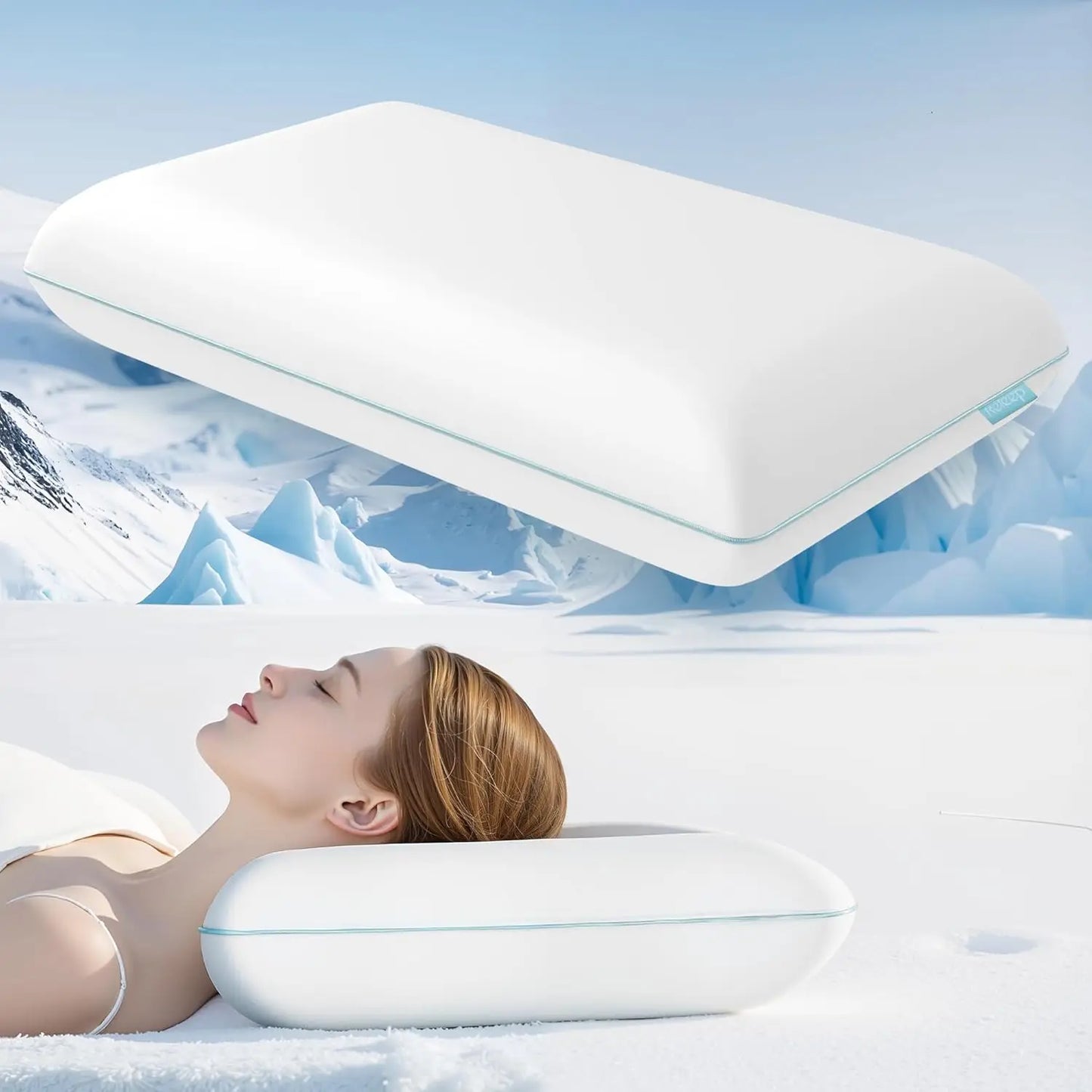 White pillow with a woman lying on a snowy landscape