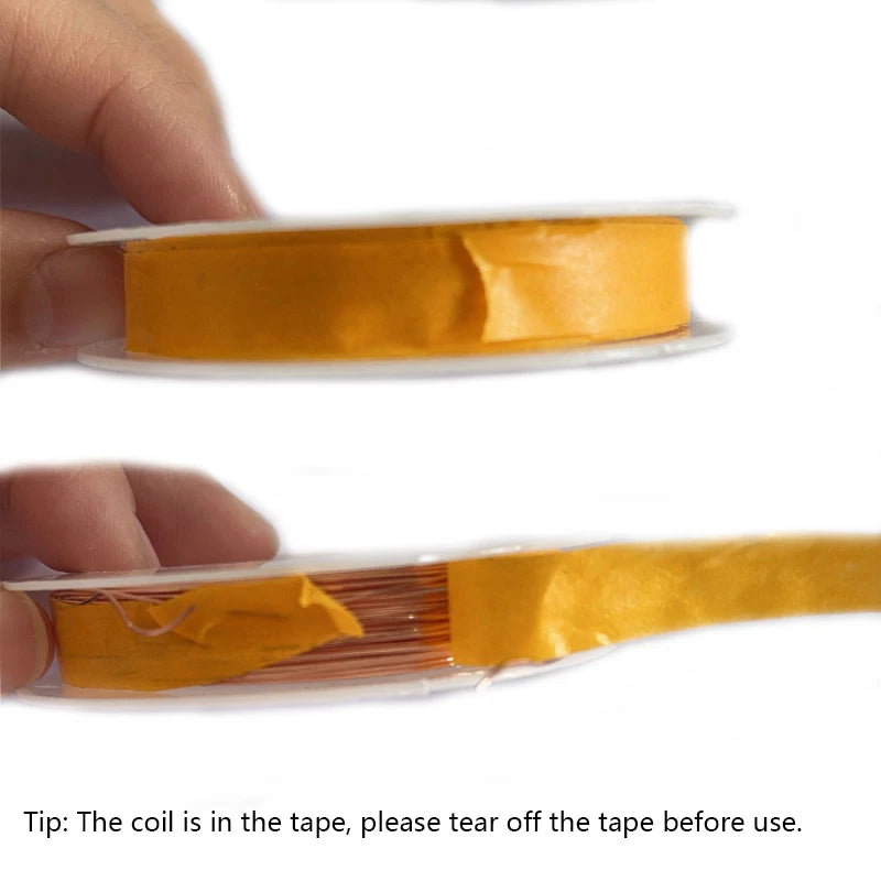 Hand holding a spool of orange tape with a clear label, on a white background.