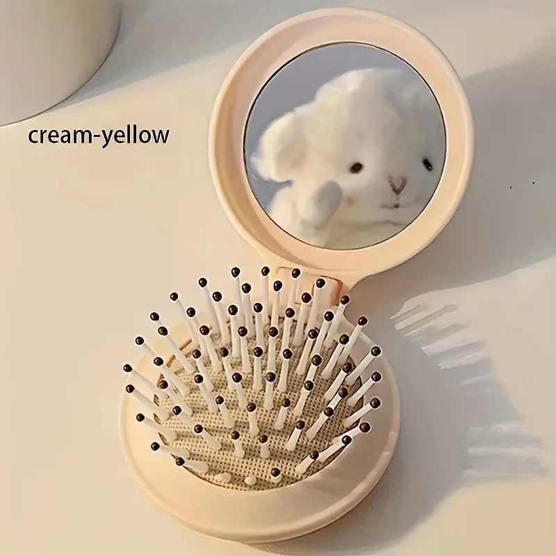 Mini Portable Folding Travel Hair Brush with Mirror for Women Lightweight Plastic Dual Fold Design for Outdoor Use Hand Washable Peaceful Pleasures Health and Wellness