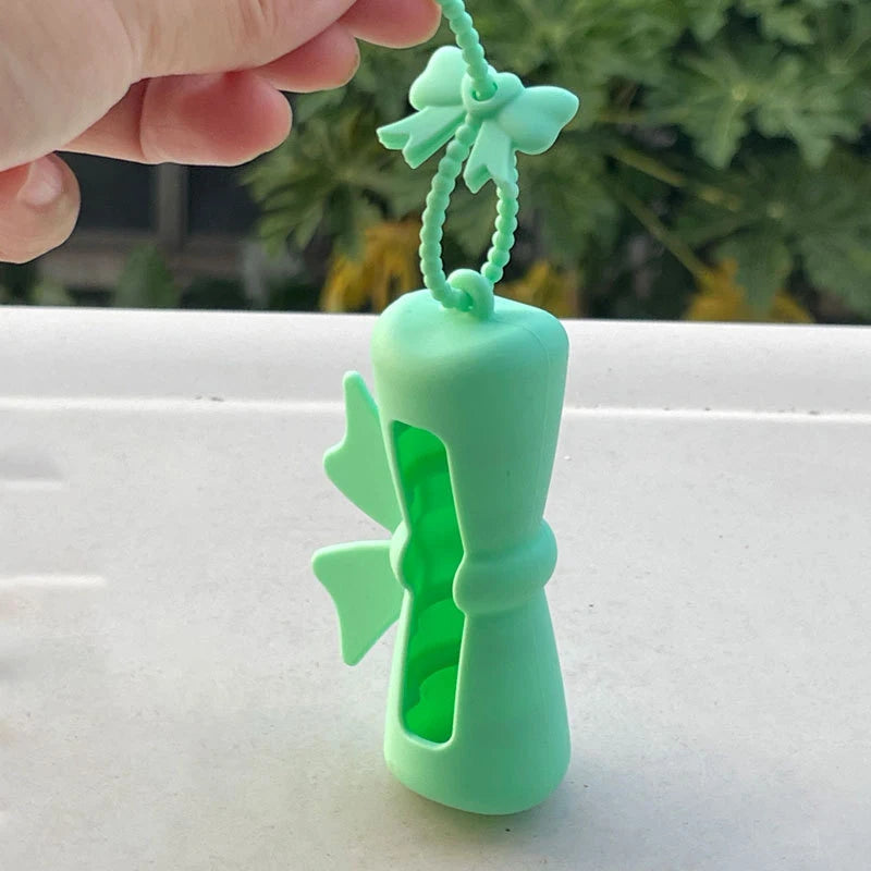 Bow Candy Peanut Shape Silicone Lipstick Cover Keychains Portable Solid Color Lipstick Storage Bag Light Weight Lip Balm Holder Peaceful Pleasures Health and Wellness D Green