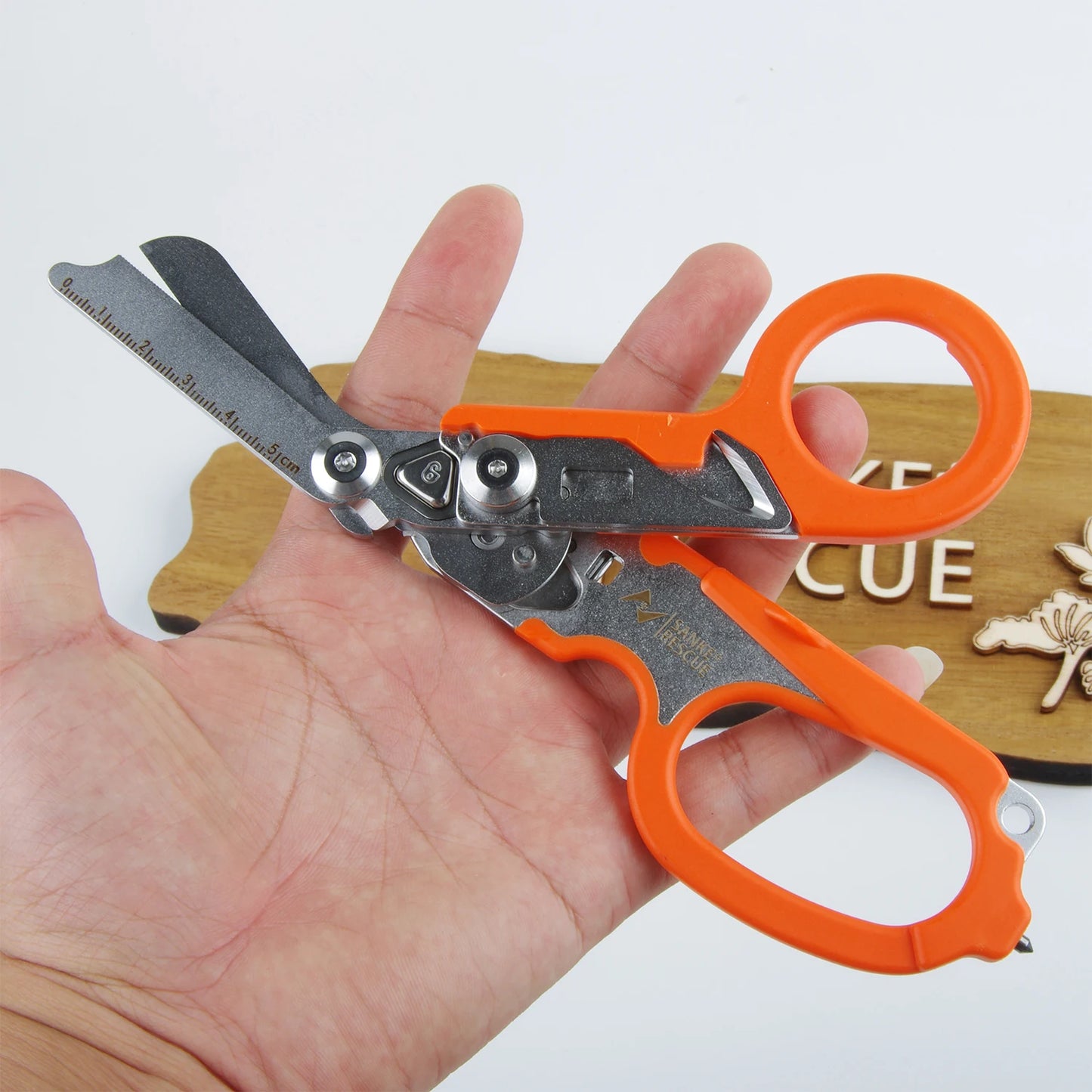Multifunctional Scissor Tactical Plier Outdoor Survival Tool Folding Creative Gadget Stainless Steel Retractable Raptors Shears Peaceful Pleasures Health and Wellness Orange