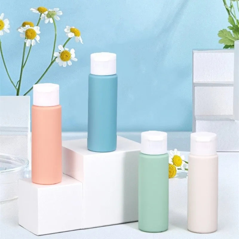 4Pcs/Set 50ml Refillable Bottle Soft Silicone Lotion Container Flip-Top Squeeze Tube Empty Bottle Portable Travel Shampoo Bottle Peaceful Pleasures Health and Wellness