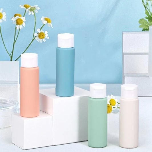 4Pcs/Set 50ml Refillable Bottle Soft Silicone Lotion Container Flip-Top Squeeze Tube Empty Bottle Portable Travel Shampoo Bottle Peaceful Pleasures Health and Wellness
