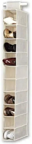 Vertical shoe organizer with various shoes inside, against a neutral background
