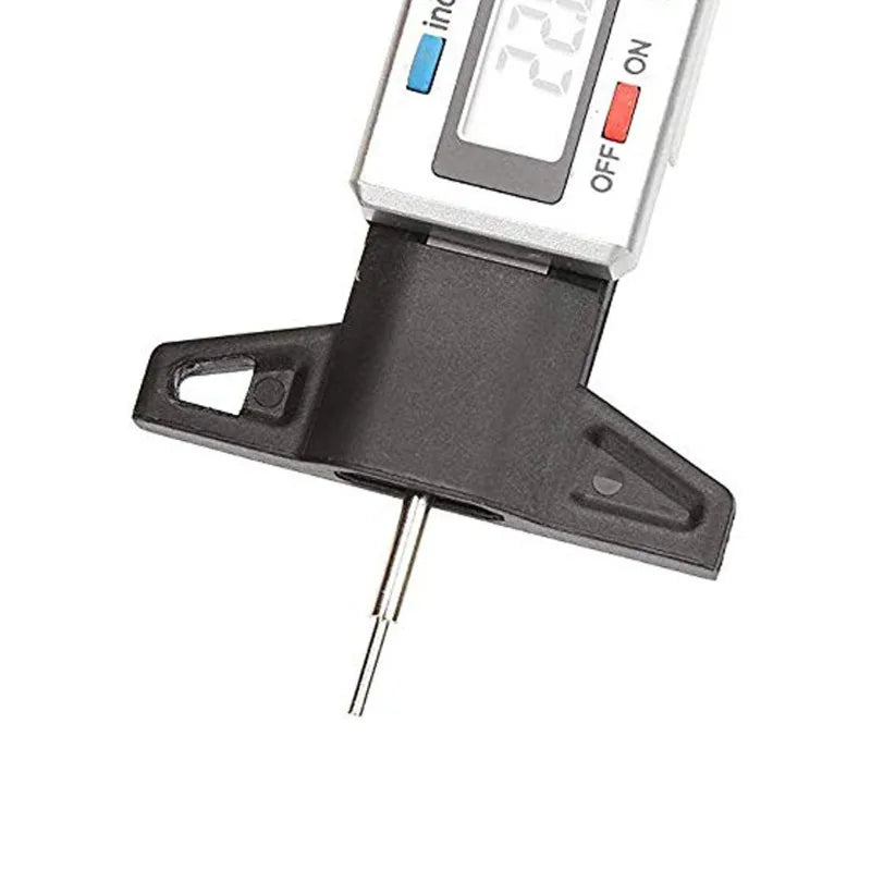 The Electronic Measuring Ruler Indicates That The Precise Range of The Tire Tread Depth Gauge Is 0 - 25 Millimeters Peaceful Pleasures Health and Wellness