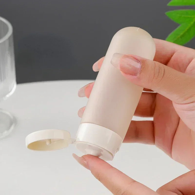 60ml Portable Plastic Tubes Bottling Bottle Cylindrical Squeeze Bottles Travel Cosmetic empty bottle for Shampoo and Shower Gel Peaceful Pleasures Health and Wellness