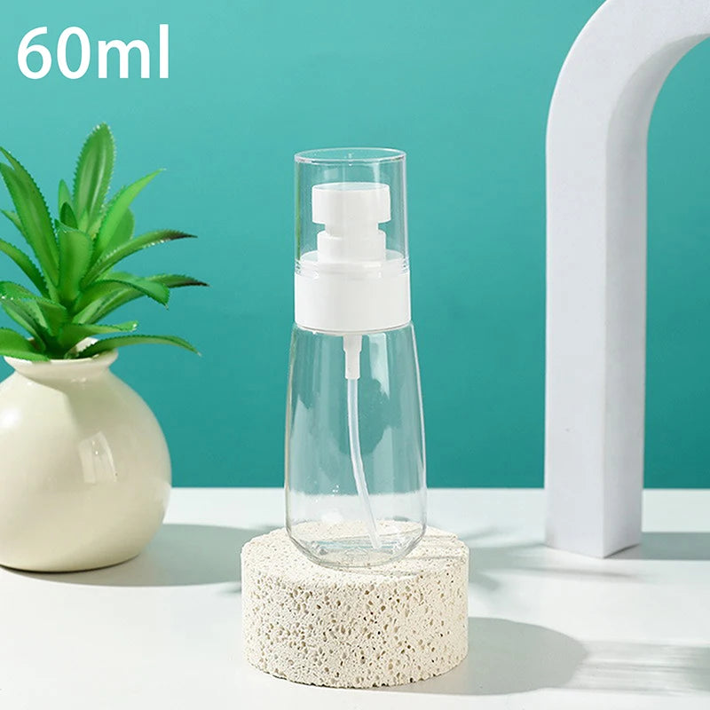 30ml/60ml/100ml Fine Mist Spray Bottle Plastic Bottl Lotion Pump Travel Perfume Water Bottles Refill Peaceful Pleasures Health and Wellness 60ml Transparent