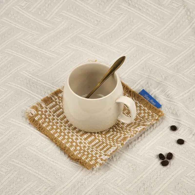 Vintage-inspired, tassel-trimmed woven coasters. checkered square fabric trivets, perfect for coffee, tea, and more Peaceful Pleasures Health and Wellness