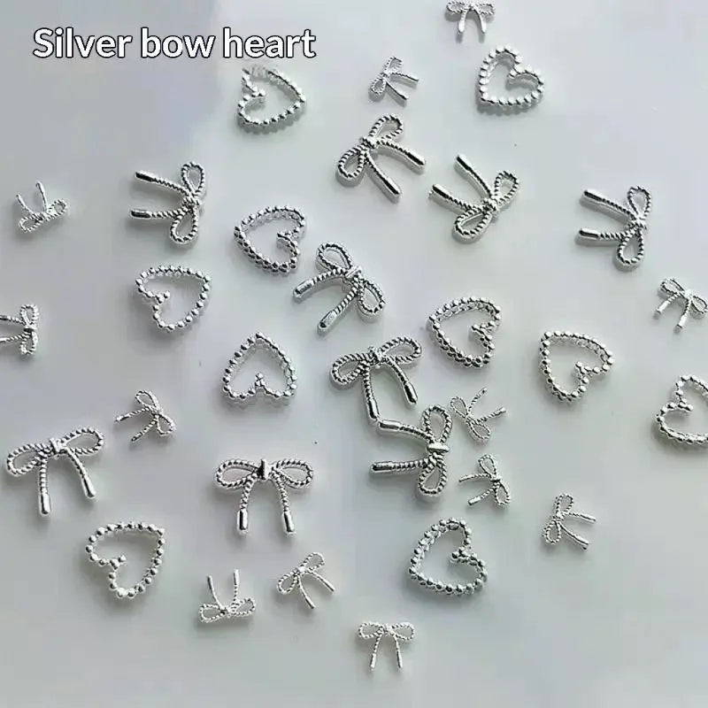 100Pcs 3D Silver Small Bowkont Heart-shaped Ornaments Nail Art Decorations Supplies DIY Alloy Bow Heart Nail Charms Accessories Peaceful Pleasures Health and Wellness