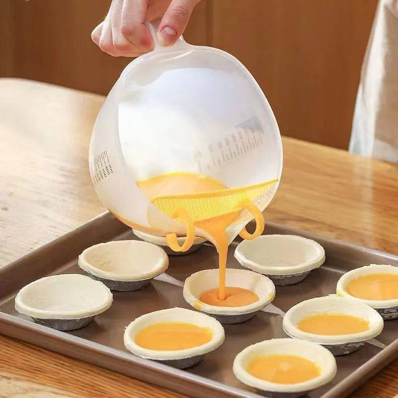 Food Grade Egg Liquid Filter Measuring Cup with Graduated and Diversion Port Egg Beater Cup for Rice Washing and Fruit Cleaning Peaceful Pleasures Health and Wellness