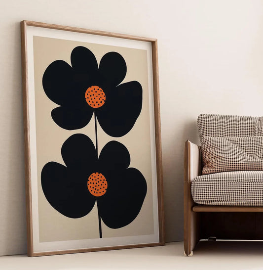 "Mid-Century Modern Minimalist Floral Art Print: Bold Black Double-Flower Design with Playful Orange Polka-Dot Centers, Perfect Peaceful Pleasures Health and Wellness