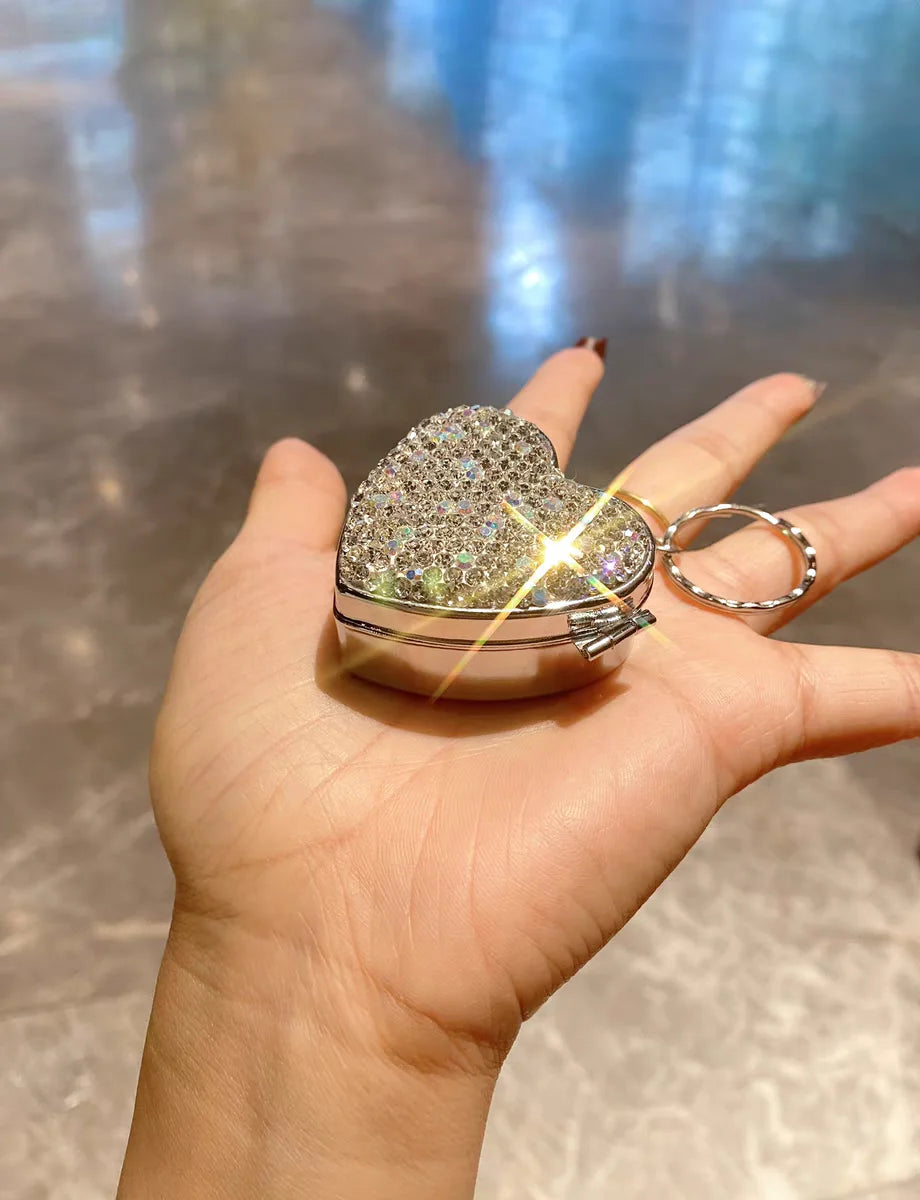 Stainless steel mini pill box Portable diamond-encrusted love pill pill capsule small object storage and distribution box Peaceful Pleasures Health and Wellness Silver