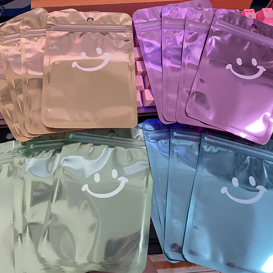 50Pcs Holographic Mylar Bags | Smell Proof Resealable Clear Window Resealable Storage Bags Peaceful Pleasures Health and Wellness