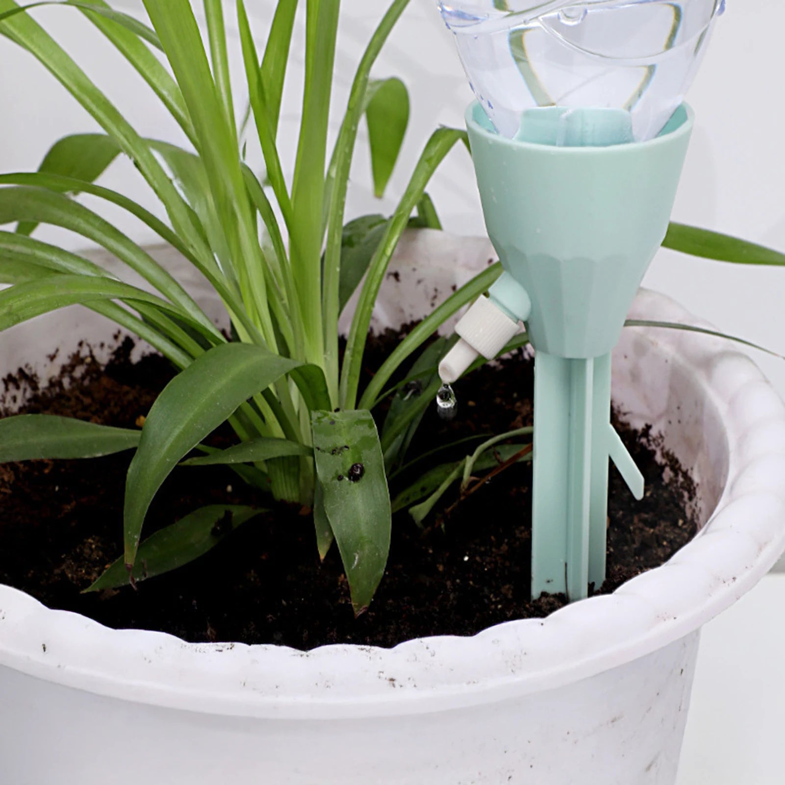 Indoor Plant Self Watering Spikes Plastic Bottles Plant Waterer Devices Garden Supplies for Garden Water Planter System Peaceful Pleasures Health and Wellness
