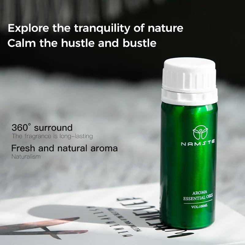 Green essential oil bottle with white cap on a magazine, text about nature and tranquility.
