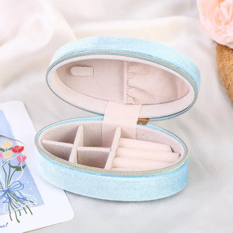 Mini Velvet Jewelry Box Oval Shape for Storage of Rings Earrings Bracelets Luxury Organizer for Home or Travel Peaceful Pleasures Health and Wellness Light blue