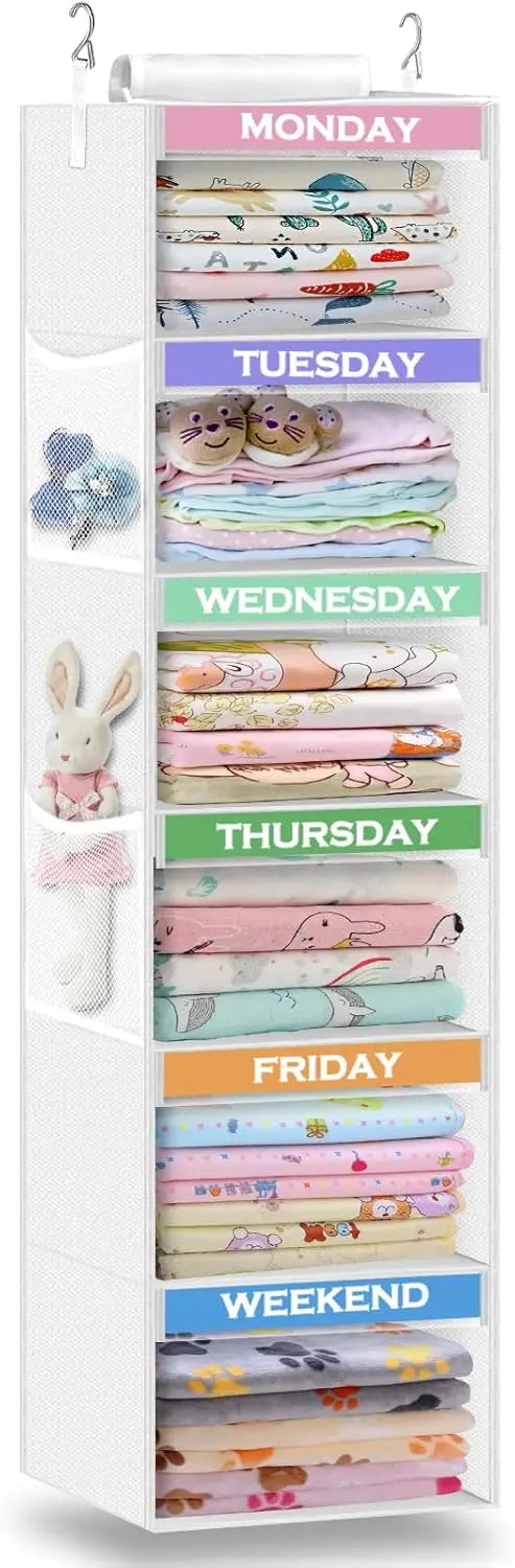Clothing organizer with days of the week labels and folded clothes for each day.