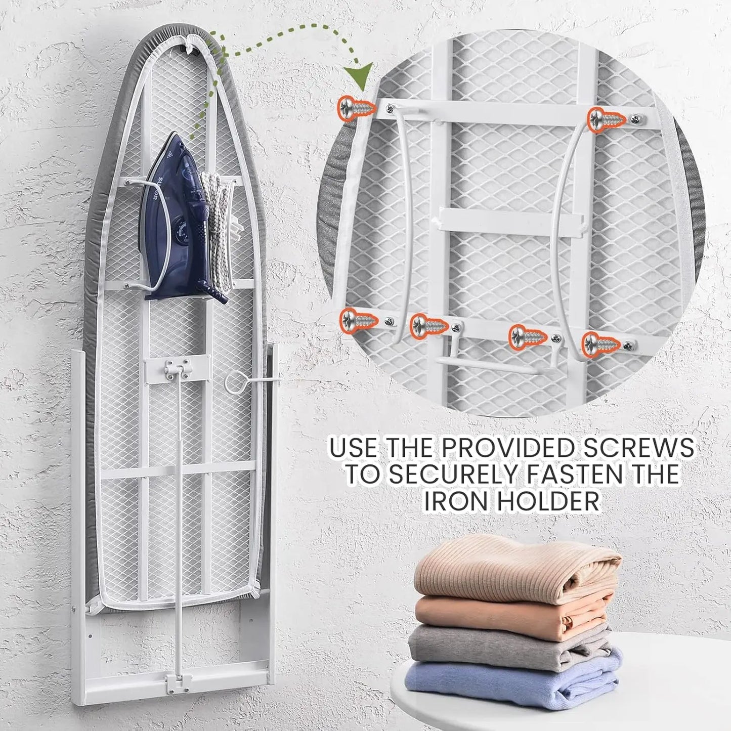 Wall-mounted ironing board with iron holder and screws, stacked folded clothes on a white surface.