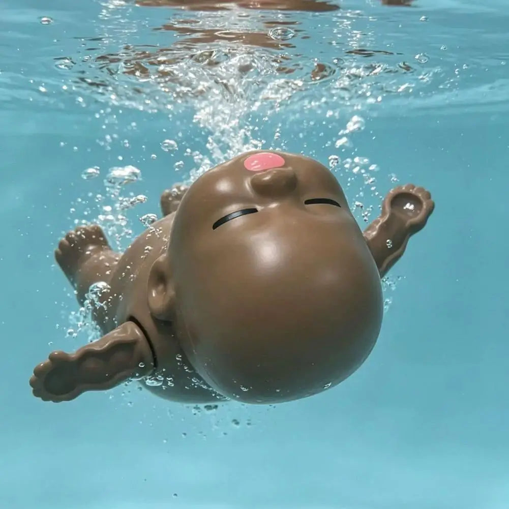 Plastic Wind Up Swimming Baby Doll Toy Realistic Floating Bathtub