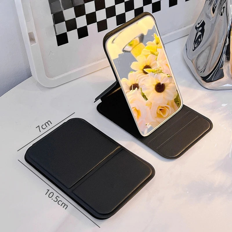 Small Makeup Mirror Portable Folding Girls' Touch-up Mirror Creative High-definition Desktop Standing Mini Portable Small Mirror Peaceful Pleasures Health and Wellness