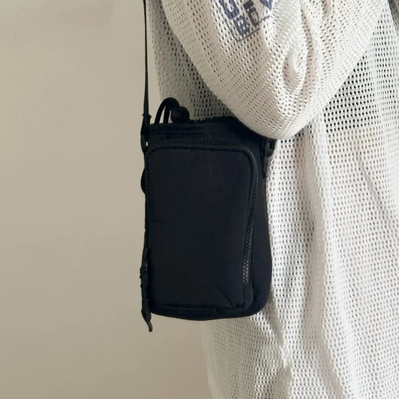 Single shoulder kettle bag, phone bag, waterproof yoga bag, sports outdoor portable bag, drawstring slanted back small bag Peaceful Pleasures Health and Wellness black