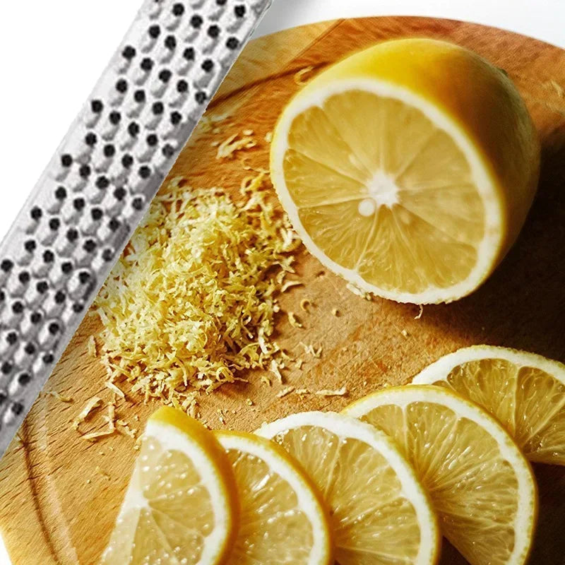Stainless Steel Handheld Cheese Grinder Garlic Grater Vegetable Fruit Grinder Lemon Zester Citrus Ginger Cheese Grinding Tools Peaceful Pleasures Health and Wellness