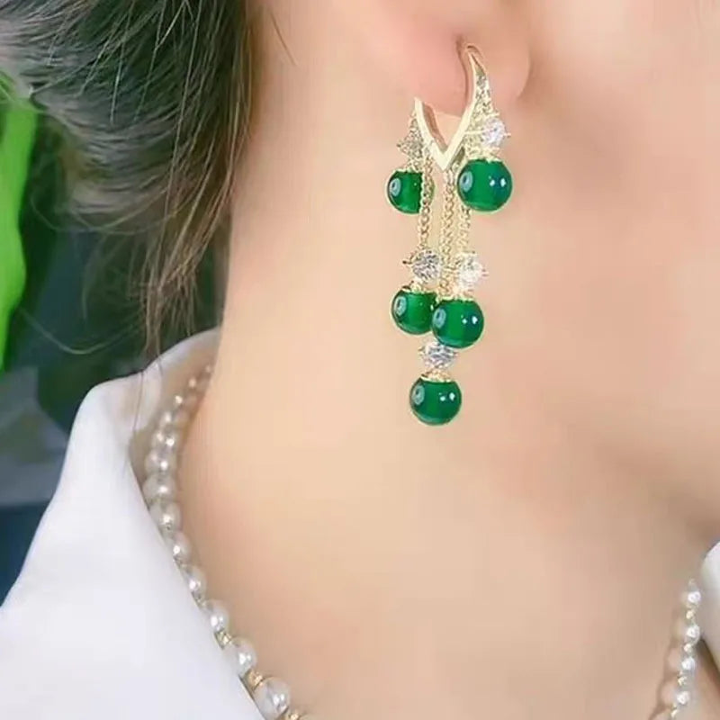 New Fashionable Niche Design, Emerald Cat Eye Stone Ear Buckle, Women's Temperament Earrings, Tassel Long Earrings Peaceful Pleasures Health and Wellness