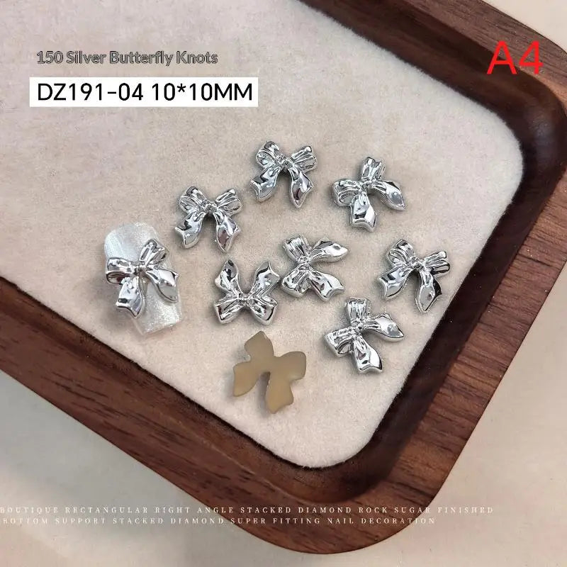 50pcs Gold Silver Brief French Bow Tie Bowknots Ribbon Resin Nail Art Rhinestones Decorations Manicure Imitation Metal Charms Peaceful Pleasures Health and Wellness A4