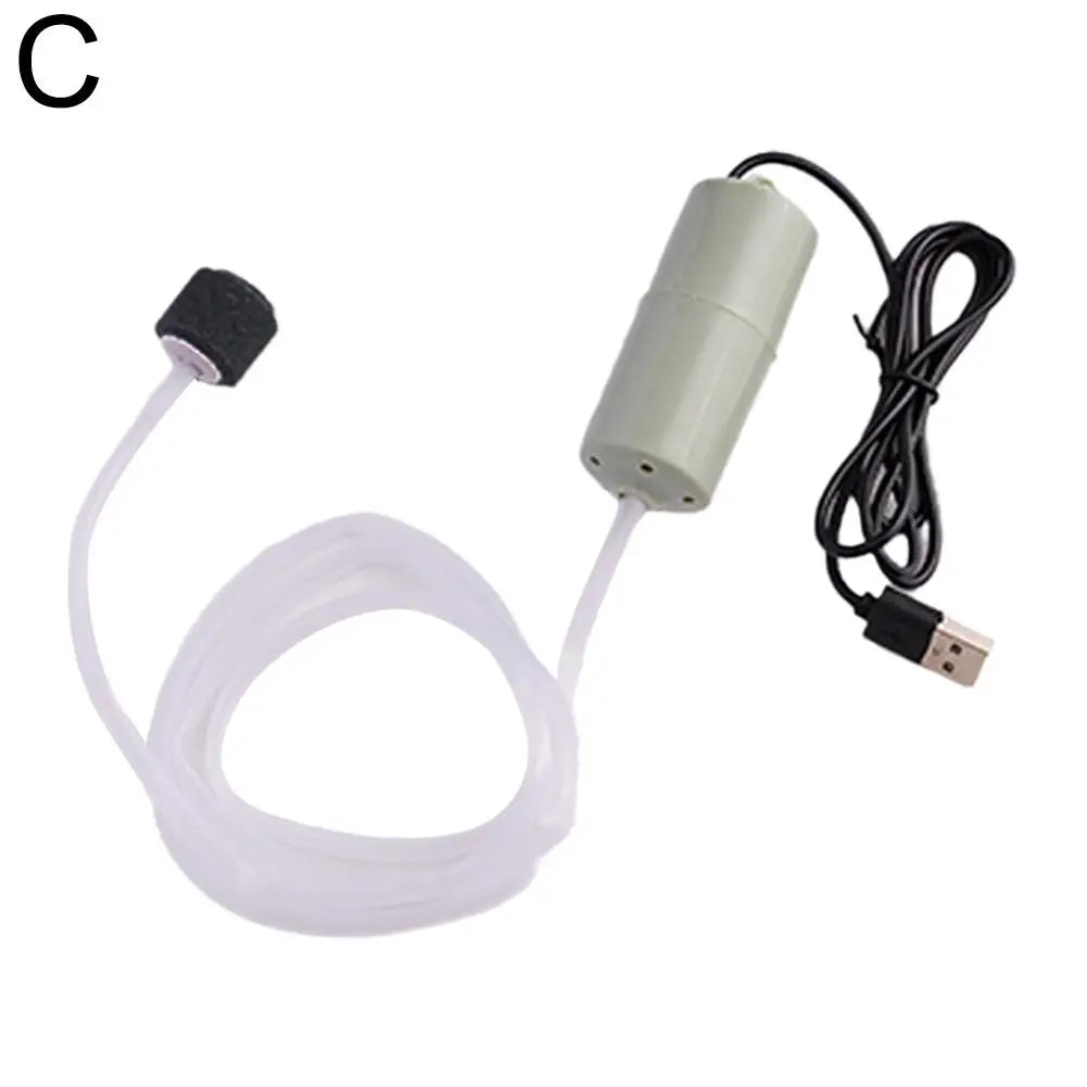 Portable Mini Fish Tank Oxygen Pump for Aquariums Peaceful Pleasures Health and Wellness Green