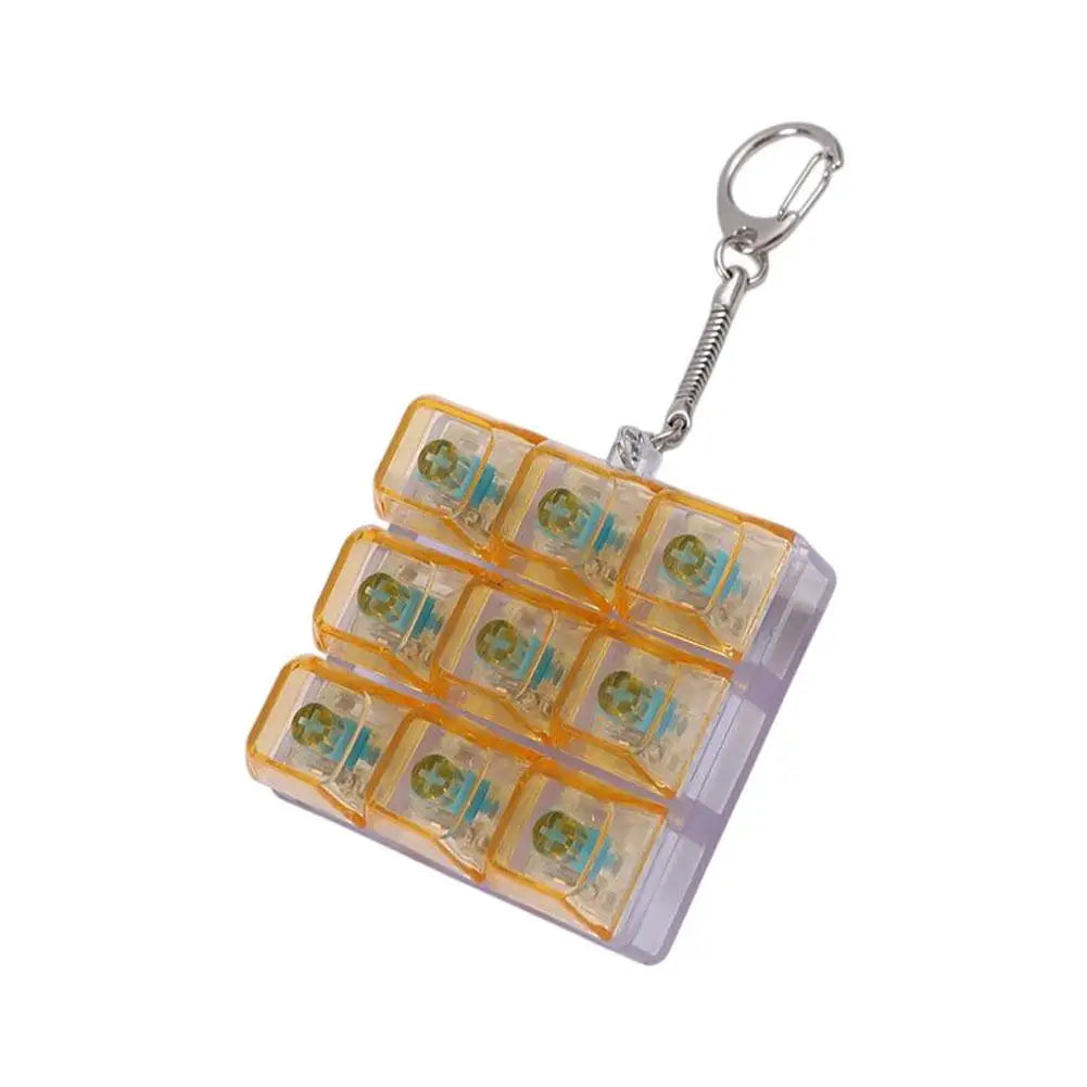 Lightweight Versatile Decompression Keychain Fingertip Press Luminous Button Toy Protable 9-key Keyboard Relieve Anxiety Toys Peaceful Pleasures Health and Wellness orange