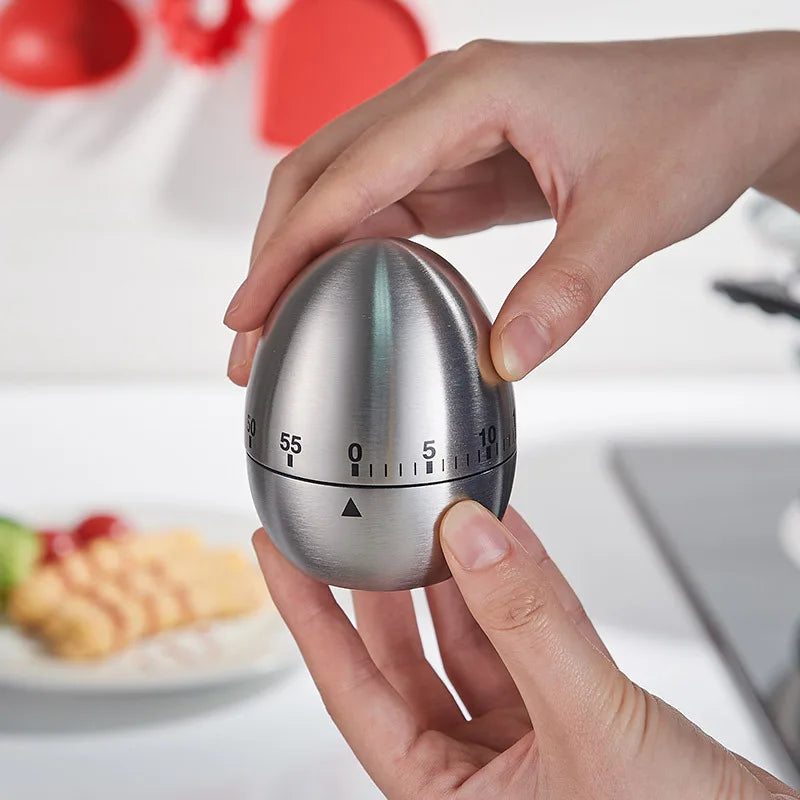 Creative Egg Shaped Mechanical Timer 60 Minute Loud Alarm Kitchen Tool Perfect for Baking Cooking and Student Study Reminder Peaceful Pleasures Health and Wellness