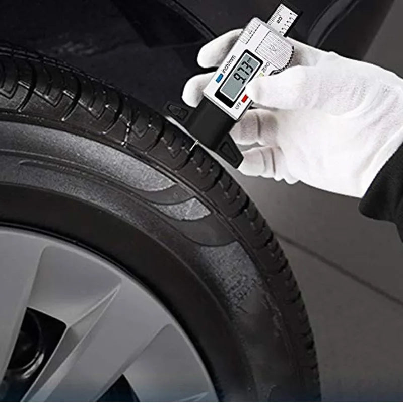 The Electronic Measuring Ruler Indicates That The Precise Range of The Tire Tread Depth Gauge Is 0 - 25 Millimeters Peaceful Pleasures Health and Wellness
