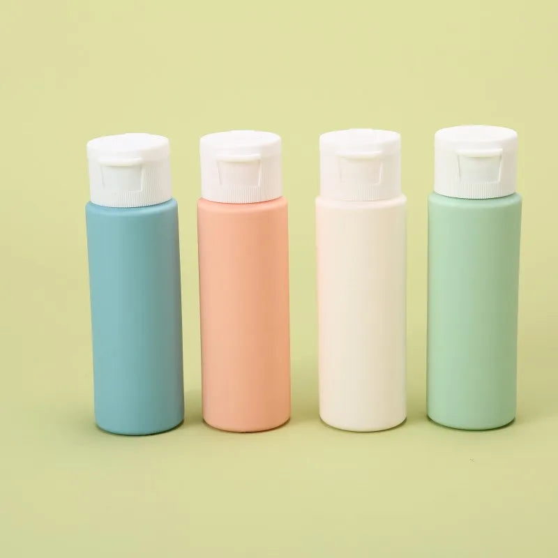 4Pcs/Set 50ml Refillable Bottle Soft Silicone Lotion Container Flip-Top Squeeze Tube Empty Bottle Portable Travel Shampoo Bottle Peaceful Pleasures Health and Wellness 4pcs Silicone