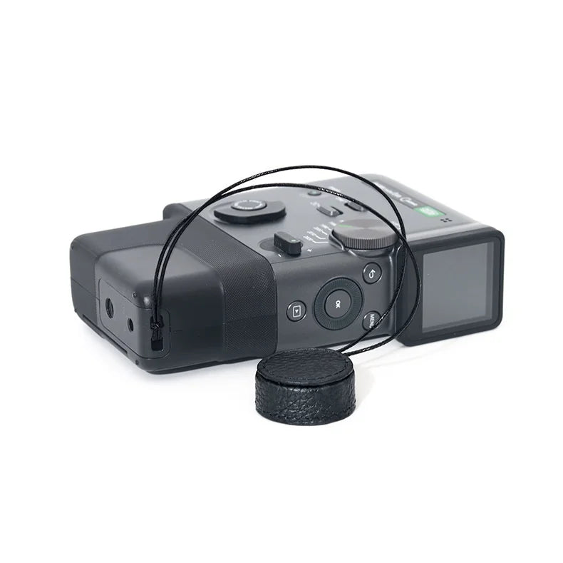 Available In A Variety Of Colors Leather Lens Cap For Instax MiniEVO Cinema Camera With Built-In Lanyard For Added Convenience Peaceful Pleasures Health and Wellness