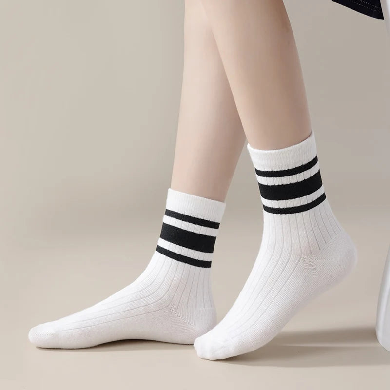 Four pairs of children's socks for spring and autumn, striped versatile style, mid-calf socks with a school style. Peaceful Pleasures Health and Wellness