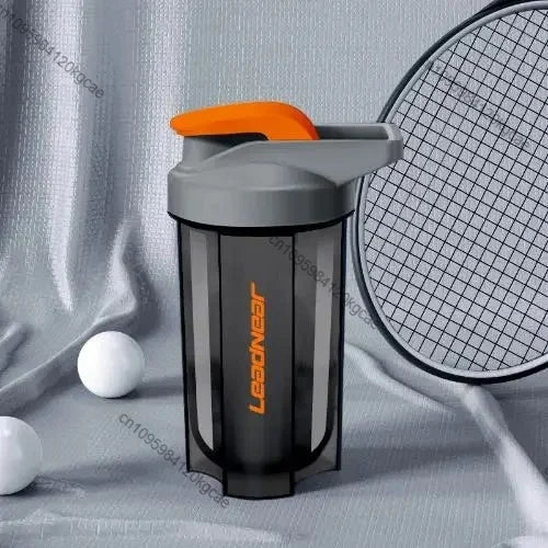 Portable Protein Shaker 500ml Fitness Bottle with Wire Whisk Ball for Fitness Enthusiasts Athletes Perfect For Outdoor Gym Cups Peaceful Pleasures Health and Wellness Orange Black 401-500ml