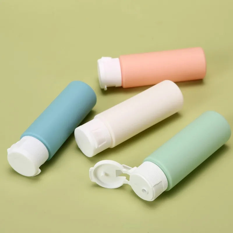 4Pcs/Set 50ml Refillable Bottle Soft Silicone Lotion Container Flip-Top Squeeze Tube Empty Bottle Portable Travel Shampoo Bottle Peaceful Pleasures Health and Wellness