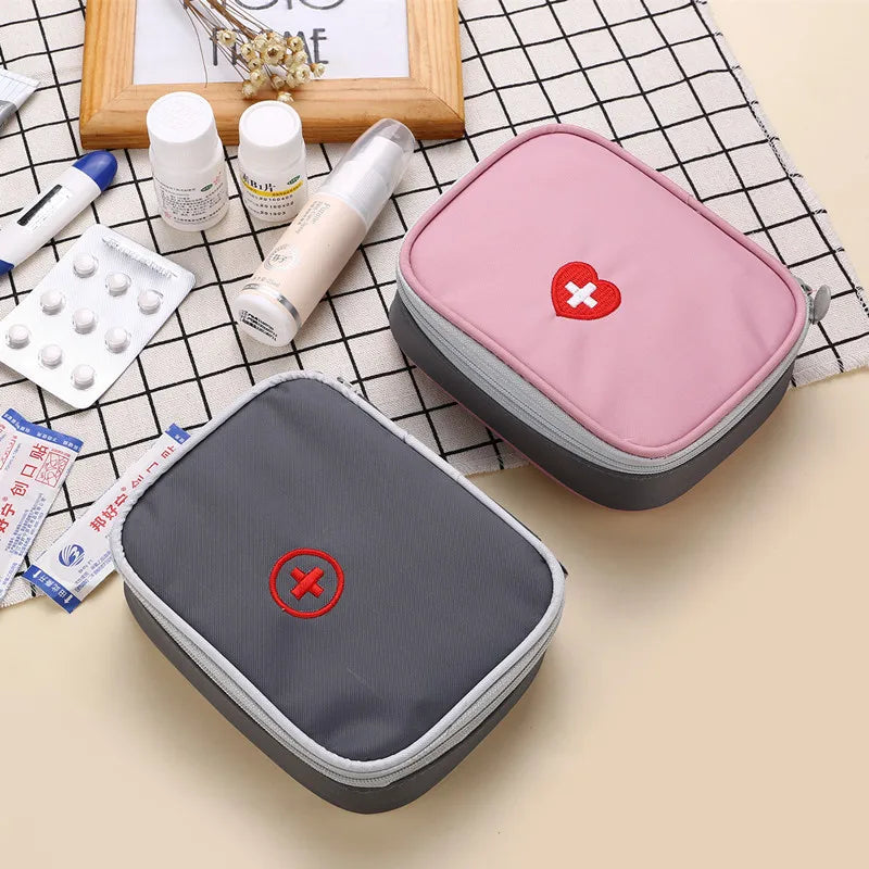 Mini Home First Aid Kit Multi-functional Storage Bag Portable Tablet Storage Large Capacity and Multiple Compartments Peaceful Pleasures Health and Wellness