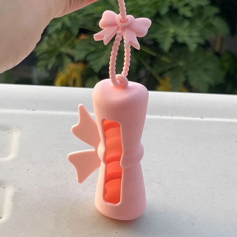 Bow Candy Peanut Shape Silicone Lipstick Cover Keychains Portable Solid Color Lipstick Storage Bag Light Weight Lip Balm Holder Peaceful Pleasures Health and Wellness D Pink