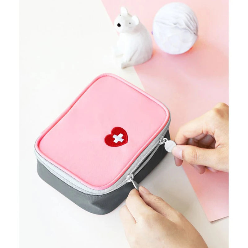 Mini Home First Aid Kit Multi-functional Storage Bag Portable Tablet Storage Large Capacity and Multiple Compartments Peaceful Pleasures Health and Wellness