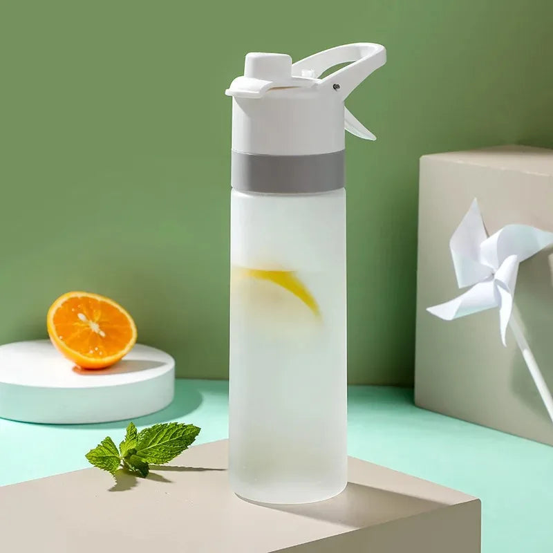 700ml BPA-Free Spray Water Bottle – Leakproof & Portable