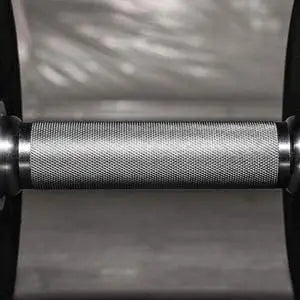 Close-up of a metal spool with textured surface