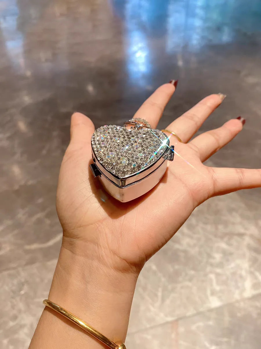 Stainless steel mini pill box Portable diamond-encrusted love pill pill capsule small object storage and distribution box Peaceful Pleasures Health and Wellness