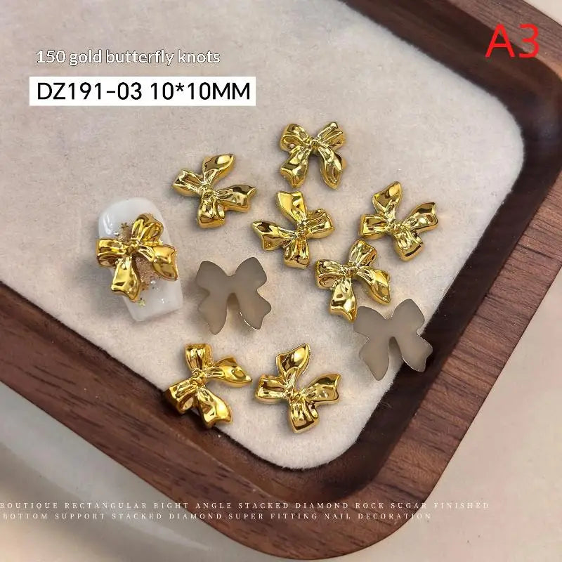 50pcs Gold Silver Brief French Bow Tie Bowknots Ribbon Resin Nail Art Rhinestones Decorations Manicure Imitation Metal Charms Peaceful Pleasures Health and Wellness A3