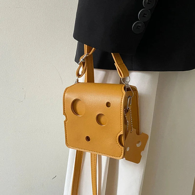 New Fashionable Mini Perforated Cheese Shaped Triangle Crossbody Coin Purse Small Square Bag for Lipstick and Earphones Cute Bag Peaceful Pleasures Health and Wellness