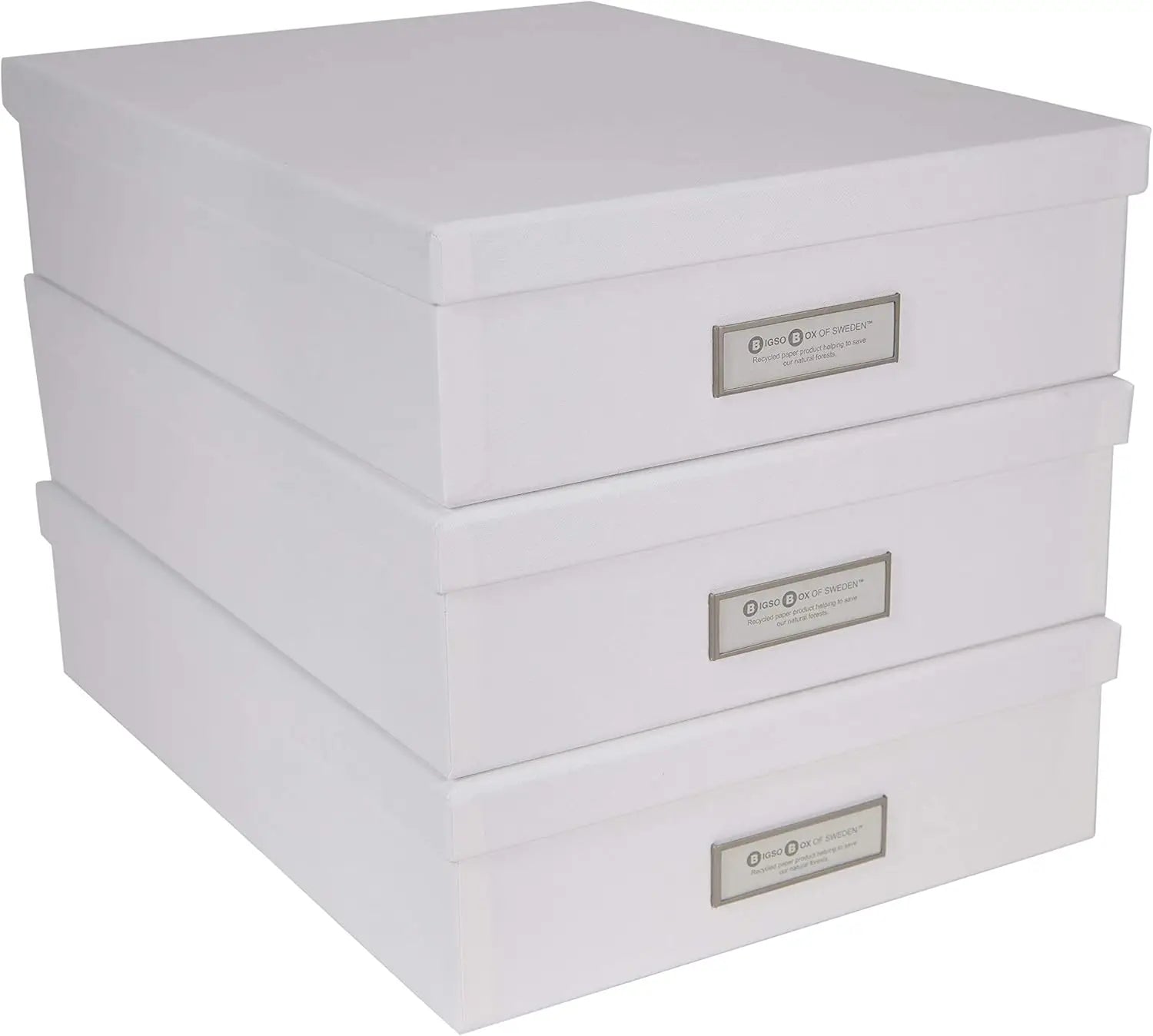 Set of three white storage boxes with labels on a white background